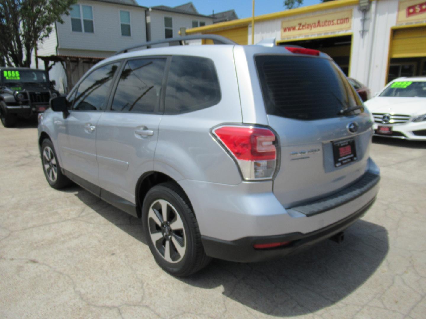 2018 Silver /Black Subaru Forester 2.5I (JF2SJABC5JH) with an 2.5L H4 F DOHC 16V engine, Automatic transmission, located at 1511 North Shepherd Dr., Houston, TX, 77008, (281) 657-1221, 29.798361, -95.412560 - 2018 SUBARU FORESTER 2.5I VIN: JF2SJABC5JH521576 J F 2 S J A B C 5 J H 5 2 1 5 7 6 4 DOOR WAGON/SPORT UTILITY 2.5L H4 F DOHC 16V GASOLINE ALL WHEEL DRIVE - Photo#18